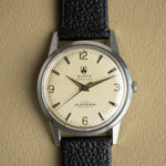 Cream dial of the Büren Grand Prix Super-Slender, applied indexes, vintage watch