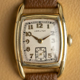 Cadran patiné de la Hamilton Dodson, chiffres arabes et petite seconde, montre vintage