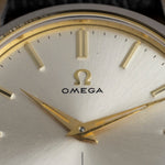 Omega logo and gold hands on the sunburst dial of the 1952 Jumbo, vintage watch