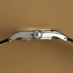 Crown-side profile of the 36 mm steel case of the Omega Jumbo 2639-12, antique watch