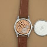 Omega Jumbo 2639-12 ouverte, mouvement et fond de boîte visibles, montre ancienne