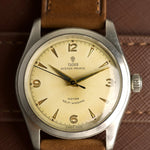 Esfera crema con pátina del Tudor Oyster Prince 7808, logotipo de la rosa e inscripción Rotor Self-Winding, reloj vintage