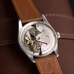 Tudor Oyster Prince abierto, movimiento automático visible, reloj antiguo