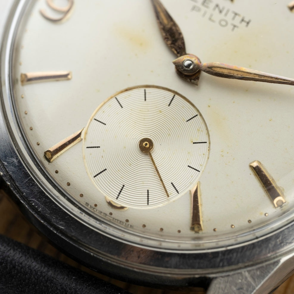 Small seconds at 6 o'clock and gold indexes on the Zenith Pilot dial, vintage watch