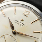 Zenith star logo and Pilot text on the patinated cream dial, vintage watch
