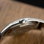 Crown-side profile of the Zenith Pilot steel case, vintage watch