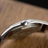 Crown-side profile of the Zenith Pilot steel case, vintage watch