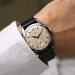 Vintage Zenith Pilot from 1960 on the wrist, cream dial and black leather strap