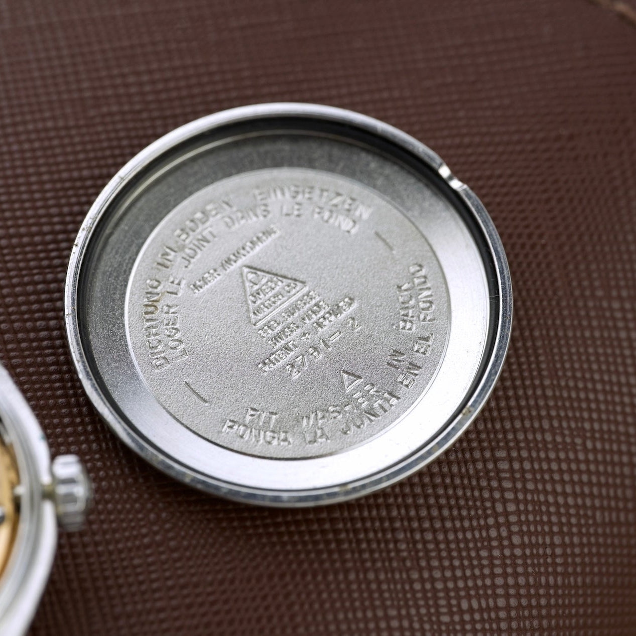 Engraved caseback interior of the Omega 2791-2, vintage watch