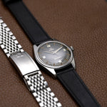 Omega Ranchero livrée avec deux bracelets, cuir noir et acier grains de riz, montre ancienne